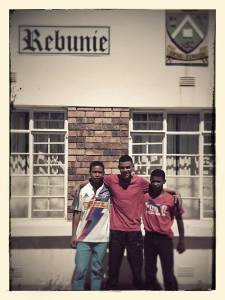 Ryno Botes, Winston van Rooi & Percy Cyster checking into their new hostel